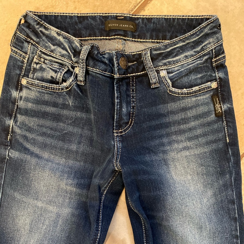 Brand new never worn silver Jeans Suki Slim boot